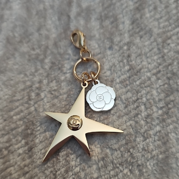 CHANEL Jewelry - CHANEL Gold Star and Silver Flower Charm